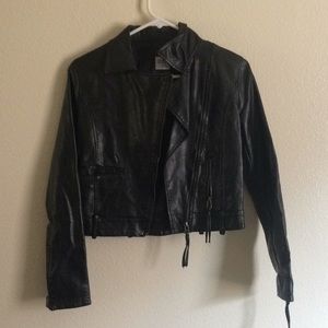 Black Foreign Exchange faux leather jacket.